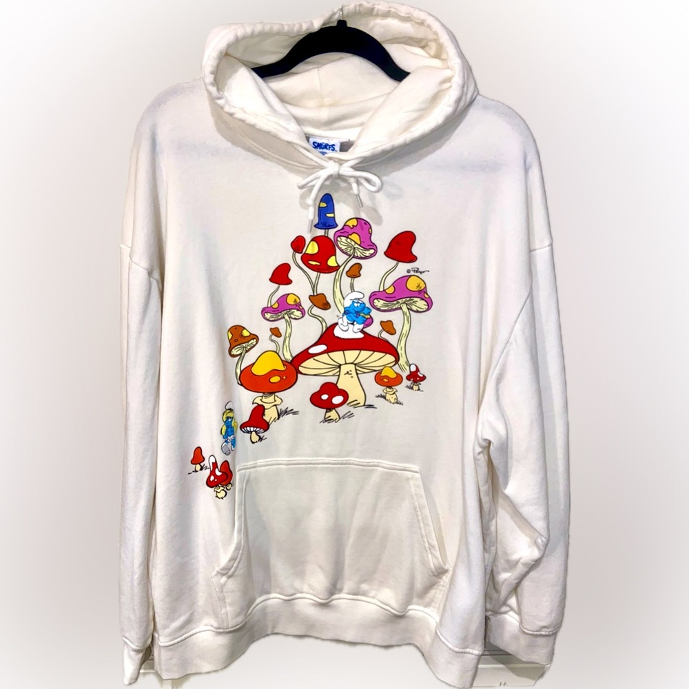 SMURFS Hoodie Size XL. Cream color with Graphics on the front.
